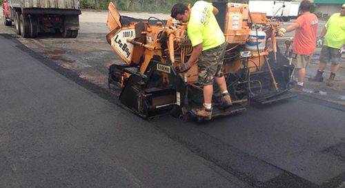 image of frontloader with excavator