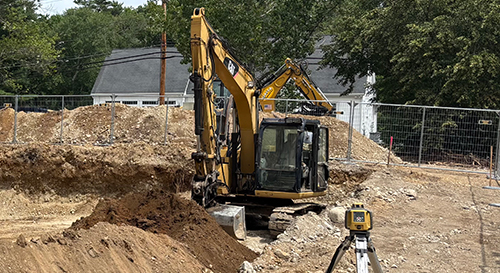 image of frontloader with excavator